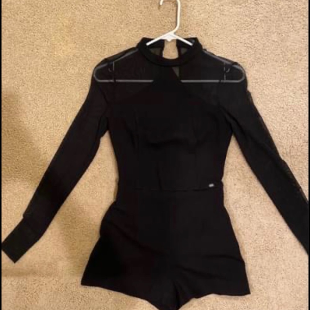 Nordstrom, black shorts romper with sheer/mesh details. Size small